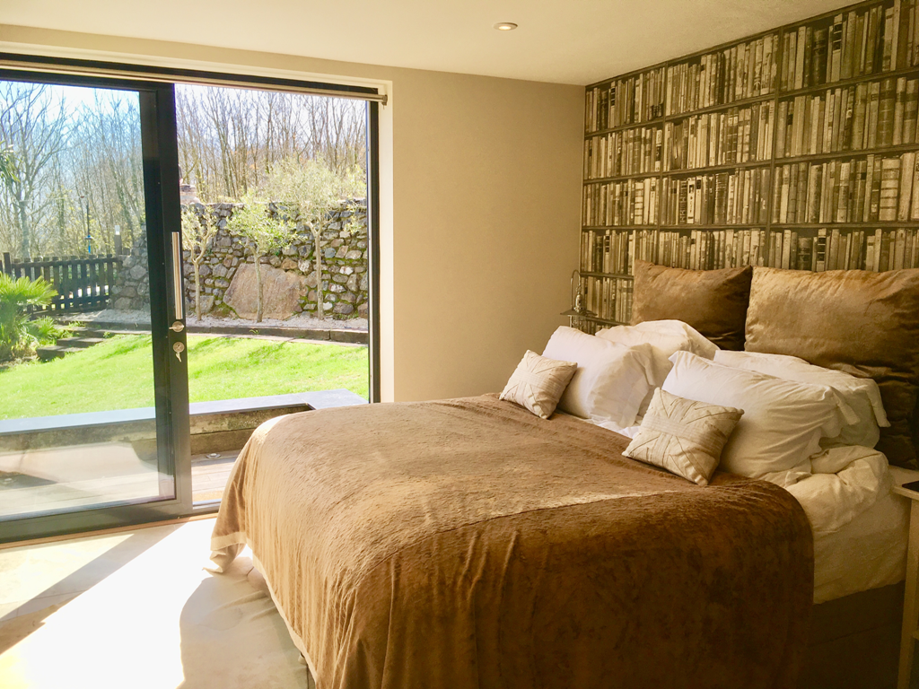 Bedroom view towards the garden - The Summer House from Stylish Cornish Cottages