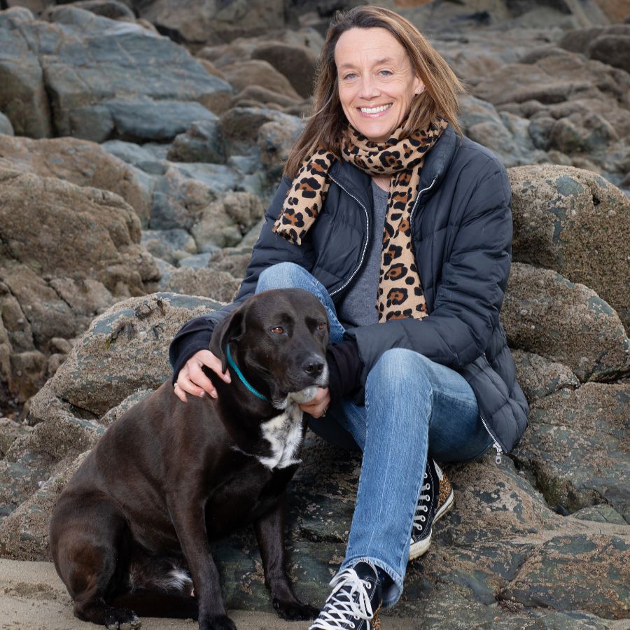 Phay MacDowel, Founder of Stylish Cornish Cottages, and Robbie a Black Staffie Cross Dog