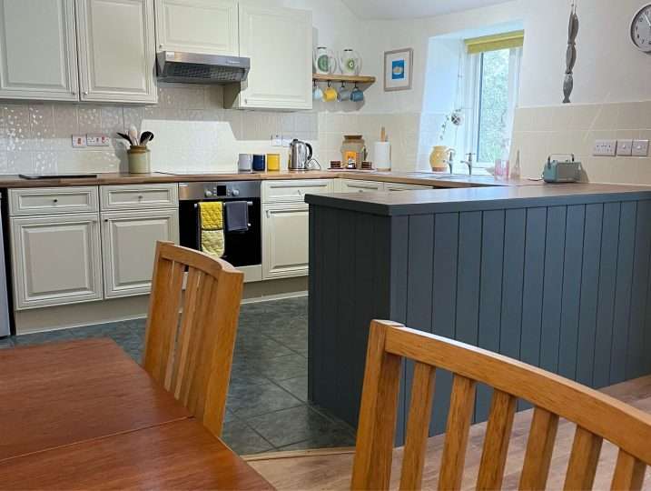 Cornish Barn Near Coast | Dining Area with kitchen in background