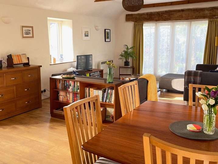 Cornish Barn Near Coast | Dining area with open plan sitting room