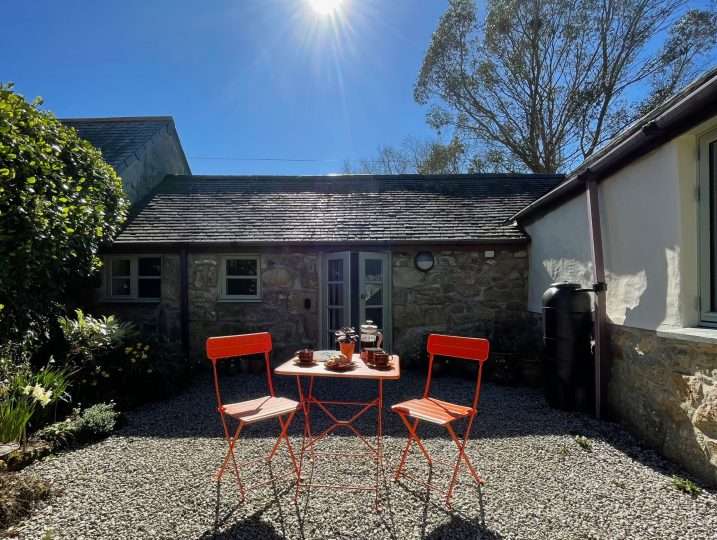 Cornish Barn Near Coast | Private Patio with small table and chairs