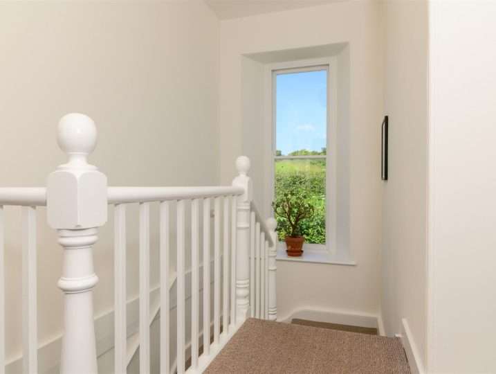 Landing with view to field | Family Holiday Cornwall Near Beach