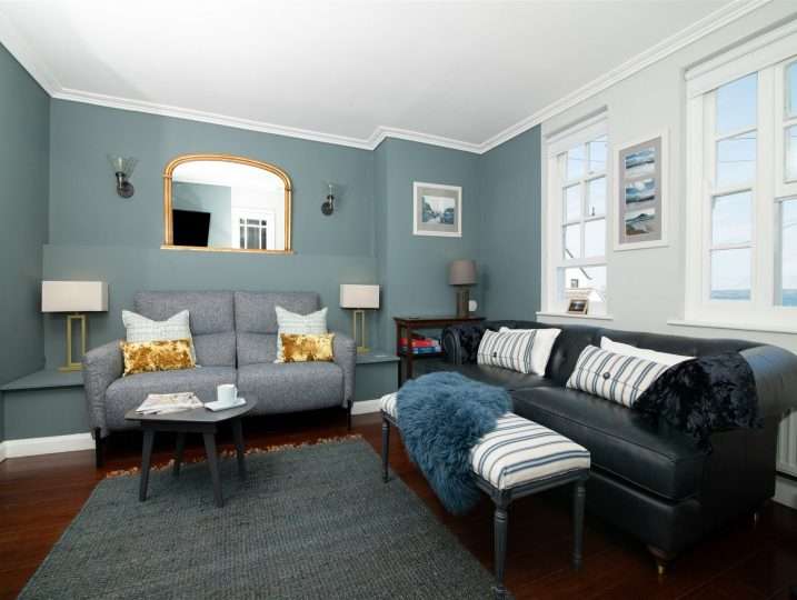Stylish sitting room with two sofas & sea views | Retreat in Mousehole sea views