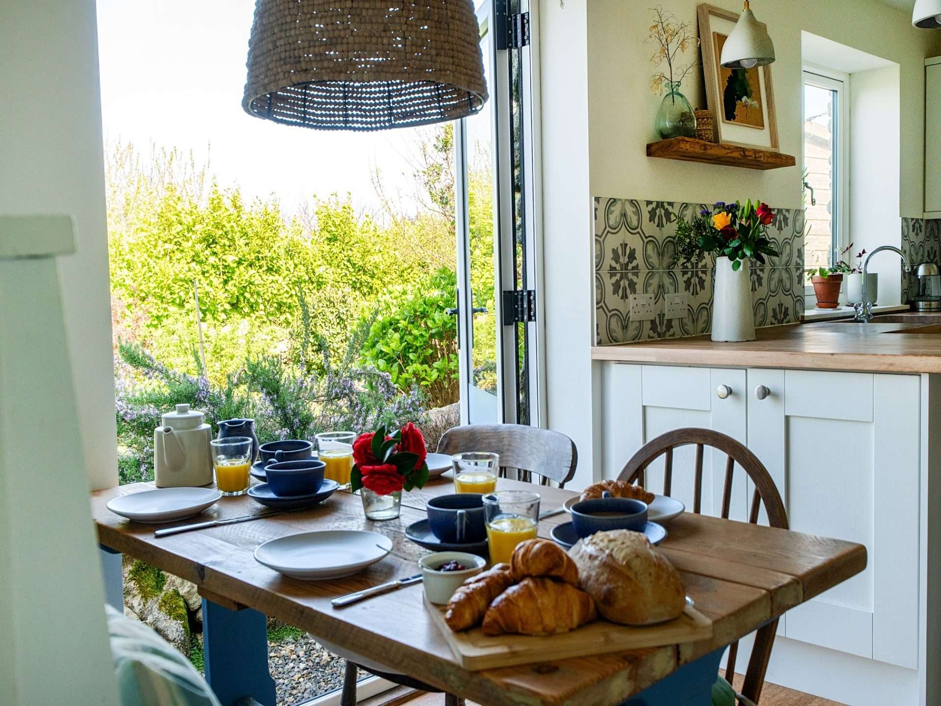 Sunny Breakfast Table with Patio Doors to Garden | Praa Sands Holiday Cottage